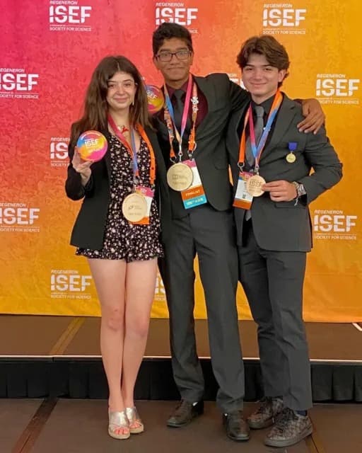 Jacob receiving a science fair prize